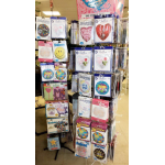 Display rack of packaged foil balloons in a store