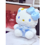 Plush Hello Kitty toy with a blue bow and dress