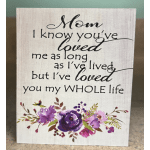 Decorative sign with a sentimental message and purple floral artwork