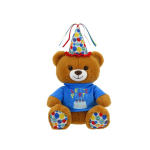 Teddy bear wearing a party hat and blue shirt