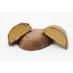 Chocolate-covered peanut butter candies cut open on a white background