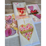 Handmade greeting cards with watercolor hearts and a coffee cup illustration