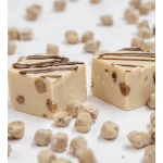 Two pieces of nut-studded fudge with chocolate drizzle