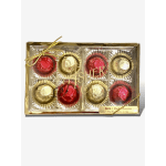 Box of assorted wrapped chocolates with a gold ribbon