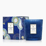 Blue Voluspa Mediterranean Lemon candle in a decorative glass jar with matching box