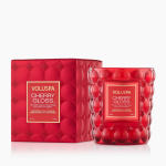 Red scented candle in a glass jar with matching box