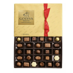 Box of assorted Godiva chocolates with a red ribbon
