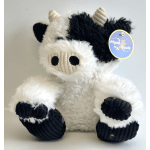 Plush black-and-white cow stuffed animal with a tag