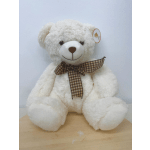 White teddy bear with a brown plaid ribbon bow