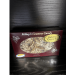 Box of Dakota Crunch candy on a dark table