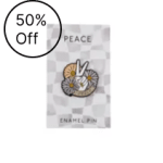 Packaged enamel pin with a peace sign and flowers