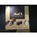 Box of Lindt gourmet truffles with assorted chocolates pictured on the front