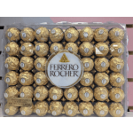 Box of Ferrero Rocher chocolates in gold wrappers