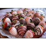 Plate of chocolate- and pink-dipped strawberries