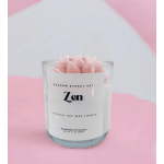 Pink candle petals in a clear glass jar with a white label