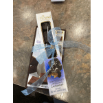 Gift box of assorted chocolates tied with a blue ribbon