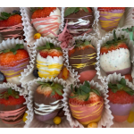 Box of chocolate-dipped strawberries in paper cups