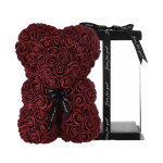 Red rose teddy bear with black ribbon on a display stand