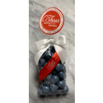 Bag of blue candies tied with a white ribbon