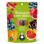 Package of assorted fruit gummy candies on a green bag