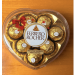 Heart-shaped box of Ferrero Rocher chocolates with a red bow