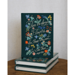 Stack of embroidered books with floral designs and the quote 'There are always flowers for those who want to see them'
