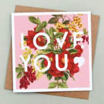 Pink card with floral illustration and the words "LOVE YOU"