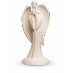 Cream-colored angel figurine with large wings on a round base