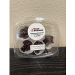 Plastic clamshell container of dark chocolate clusters
