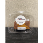 Plastic clamshell container holding milk chocolate peanut butter swirl fudge