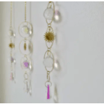 Hanging decorative strands with clear circles and small colored accents