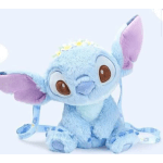 Blue plush character with large ears and brown eyes
