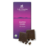 Dark chocolate bar in purple wrapper with two chocolate squares in front