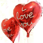 Two red heart-shaped balloons with "love you" text