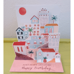 Pop-up birthday card with colorful houses and palm trees
