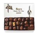 Box of assorted chocolates in a white gift box