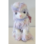 Pastel plush bunny with fluffy fur and large glittery eyes
