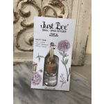 Small-space diffuser in a glass bottle with a wooden cap and hanging cord