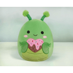 Green plush character with antennae holding a pink sprinkled heart-shaped treat.