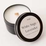 Black candle tin labeled White Sage Lavender