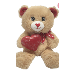 Plush teddy bear holding a red heart and wearing a red ribbon