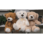 Three teddy bears sit together, one white and two tan.