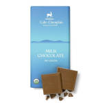 Blue wrapped milk chocolate bar with two chocolate squares and crumbs in front