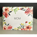 Floral card with the word MOM centered on a white background