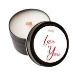 Black candle tin with a white wax candle and a "Love You" lid label