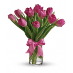 Pink tulips in a clear glass vase tied with a pink ribbon