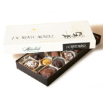 Box of assorted chocolates with the lid partly open
