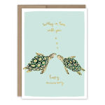 Anniversary card with two illustrated turtles and gold text
