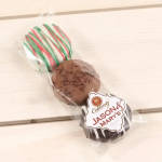 Wrapped chocolate cookies with red and green icing drizzle