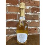 Bottle of French Bloom sparkling beverage with gold foil wrapping